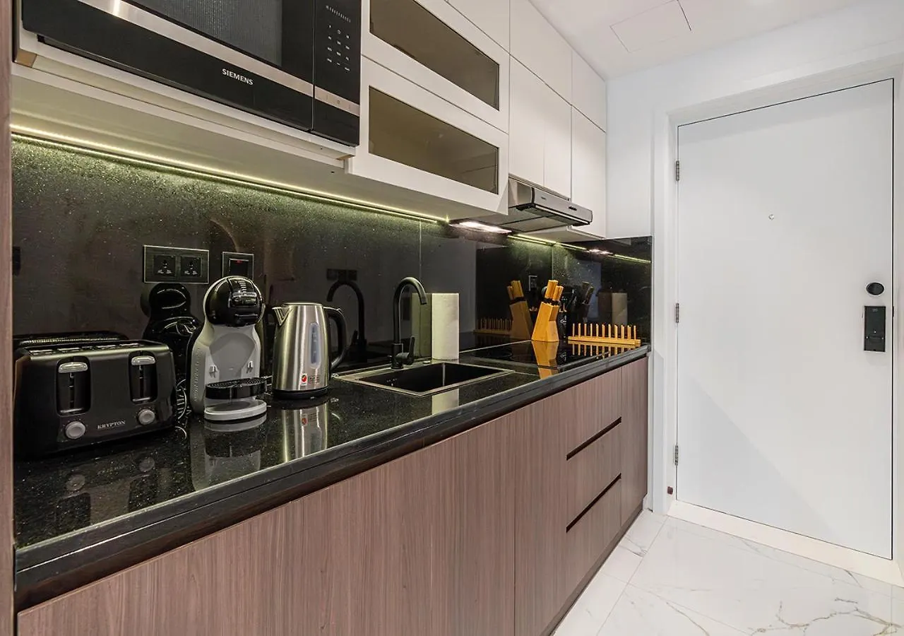 Luxurious Studio With Stunning Burj Khalifa, Pool & Lake Views Steps From Dubai Mall